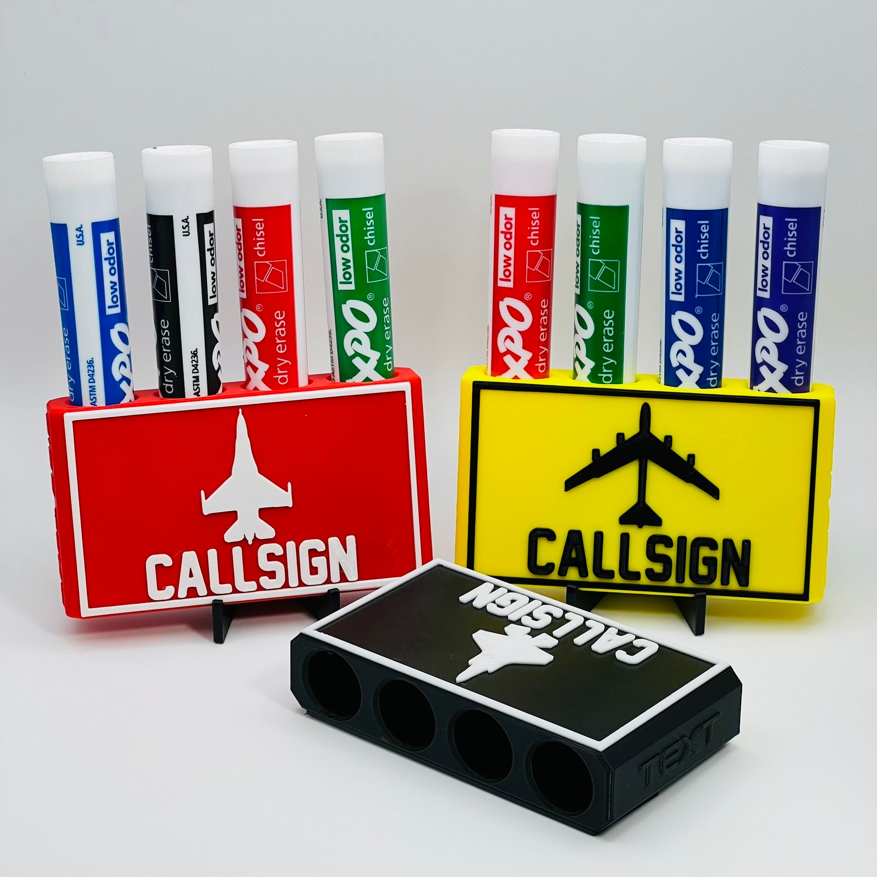 Custom Dry Erase Marker Holders that can have Callsigns, Jet silhouettes, and Side Text added to them. Jets include A-10, F-15, F-16, F-18, F-22, F-35, B-1, B-2, B-52, E-3, Mq-9, T-6, T-8, C-17, C-130, E-8, U-28.  A perfect gift for military pilots. Available in Chisel Tip, Fine Tip and Visa-Vi