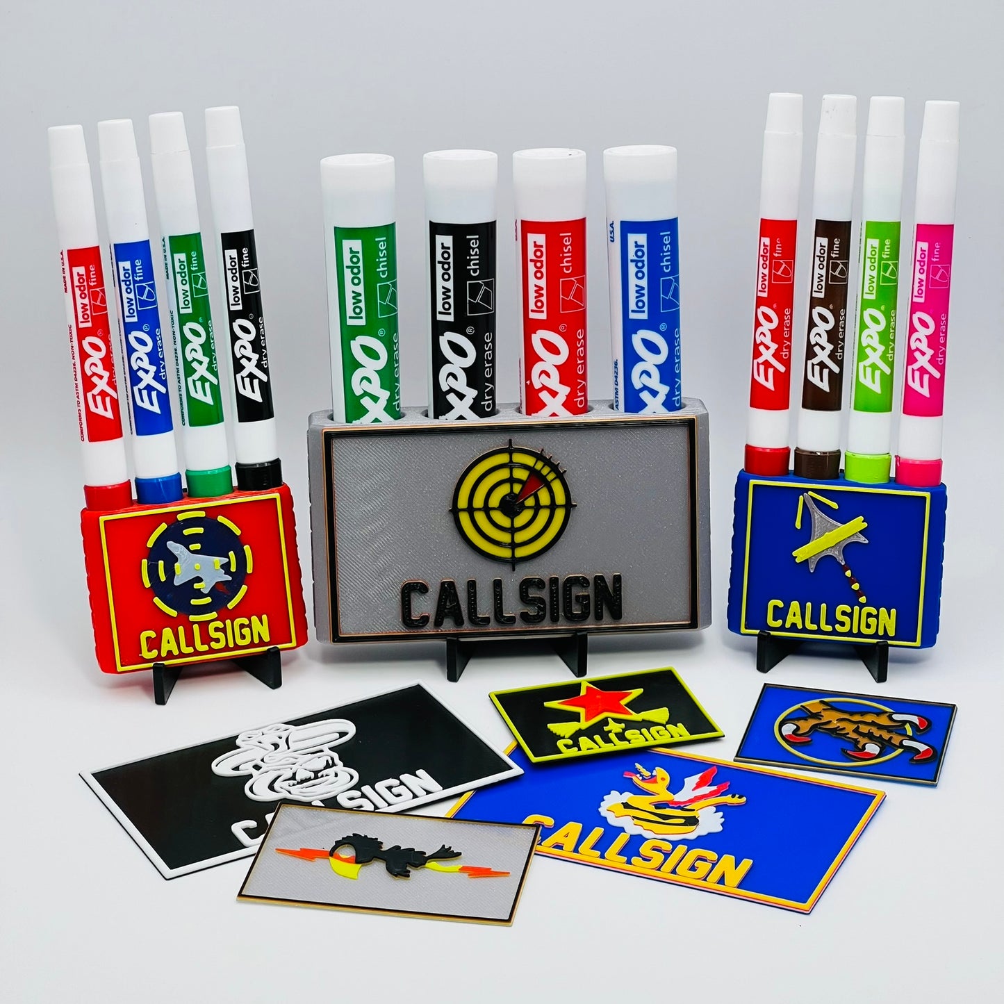Custom Dry Erase Marker Holders that can have Callsigns, Jet silhouettes, and Side Text added to them. Jets include A-10, F-15, F-16, F-18, F-22, F-35, B-1, B-2, B-52, E-3, Mq-9, T-6, T-8, C-17, C-130, E-8, U-28. A perfect gift for military pilots. Available in Chisel Tip, Fine Tip and Visa-Vi. Custom Fighter Pilot Squadron Patch Marker Holders, FAIP, Weapons School, Top Gun Graduate