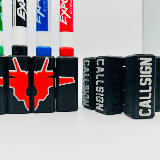 Custom Dry Erase Marker Holders that can have Callsigns, Jet silhouettes, and Side Text added to them. Jets include A-10, F-15, F-16, F-18, F-22, F-35, B-1, B-2, B-52, E-3, Mq-9, T-6, T-8, C-17, C-130, E-8, U-28.  A perfect gift for military pilots. Available in Chisel Tip, Fine Tip and Visa-Vi.