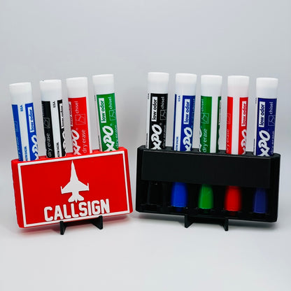 Custom Dry Erase Marker Holders that can have Callsigns, Jet silhouettes, and Side Text added to them. Jets include A-10, F-15, F-16, F-18, F-22, F-35, B-1, B-2, B-52, E-3, Mq-9, T-6, T-8, C-17, C-130, E-8, U-28.  A perfect gift for military pilots. Available in Chisel Tip, Fine Tip and Visa-Vi 