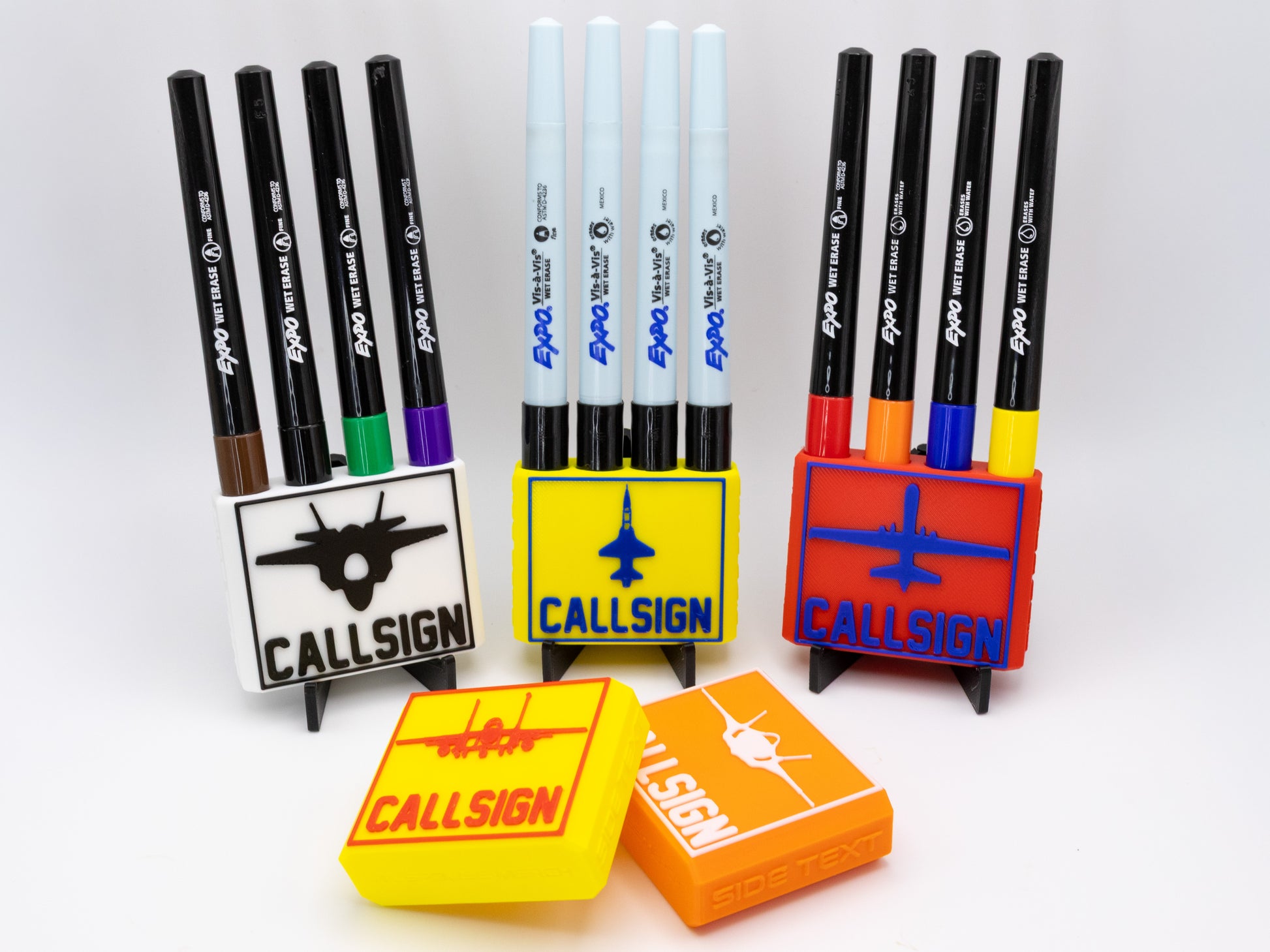 Set of markers with colorful stands on a white background